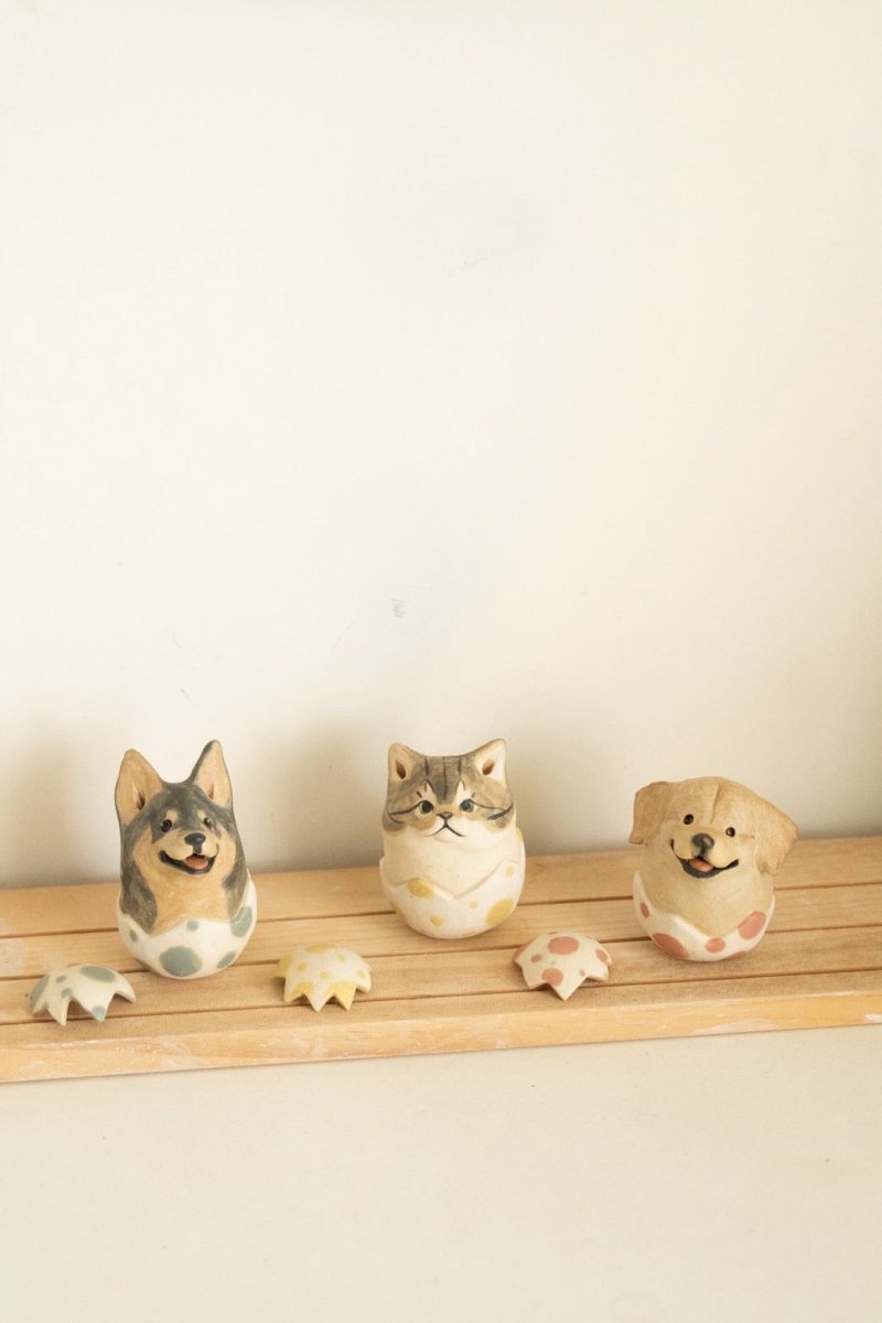 Personalized Easter pet roly-poly set. Hand-painted ceramic Golden Retriever, local mixed breed dog, and cat figurines. Custom artisan pottery studio Singapore_ In Good Thyme