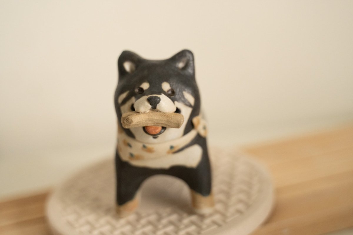 Black Shiba with stick - Pawttery