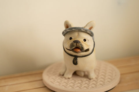 Smiley Frenchie in a hat